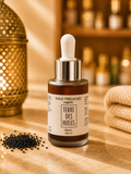 Flacon d’huile de nigelle Terre Des Huiles dans une ambiance orientale chic et naturelle.