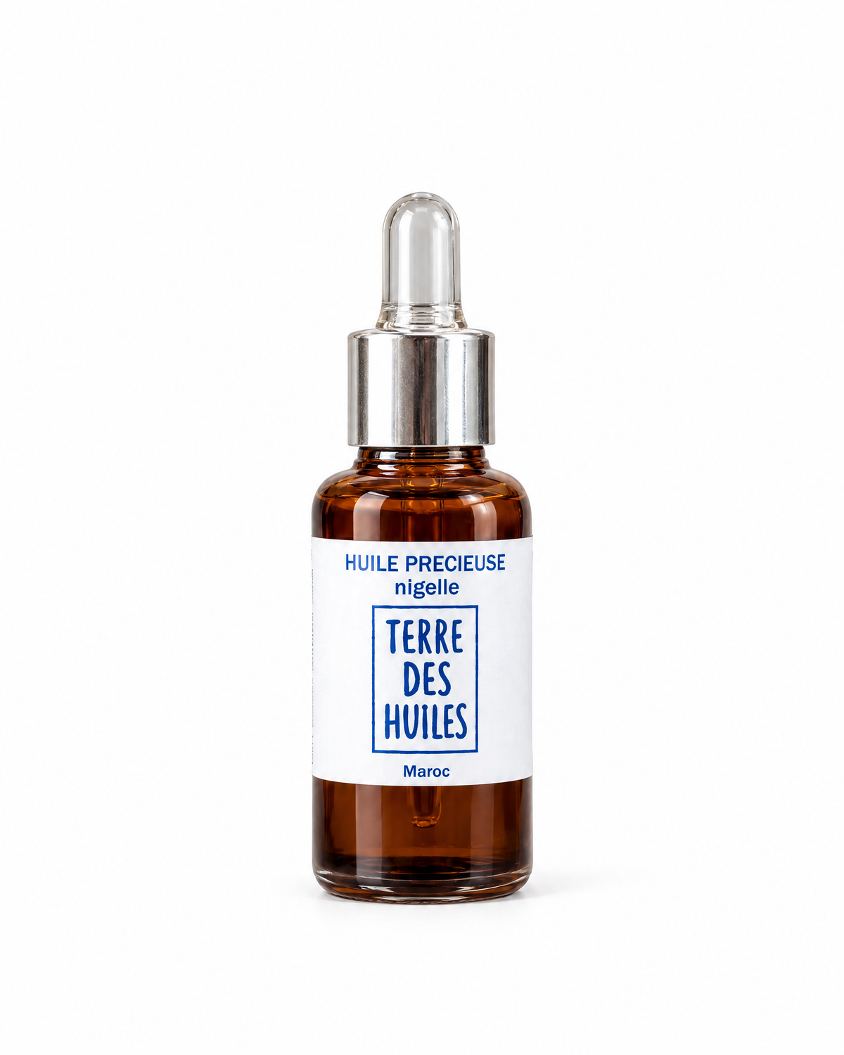 Flacon d'huile précieuse de nigelle Terre Des Huiles sur fond blanc