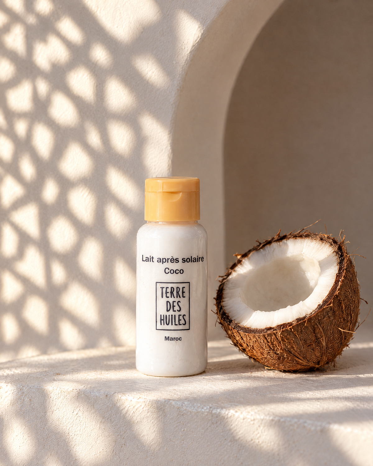 Lait après-solaire coco Terre Des Huiles avec noix de coco, lumière marocaine